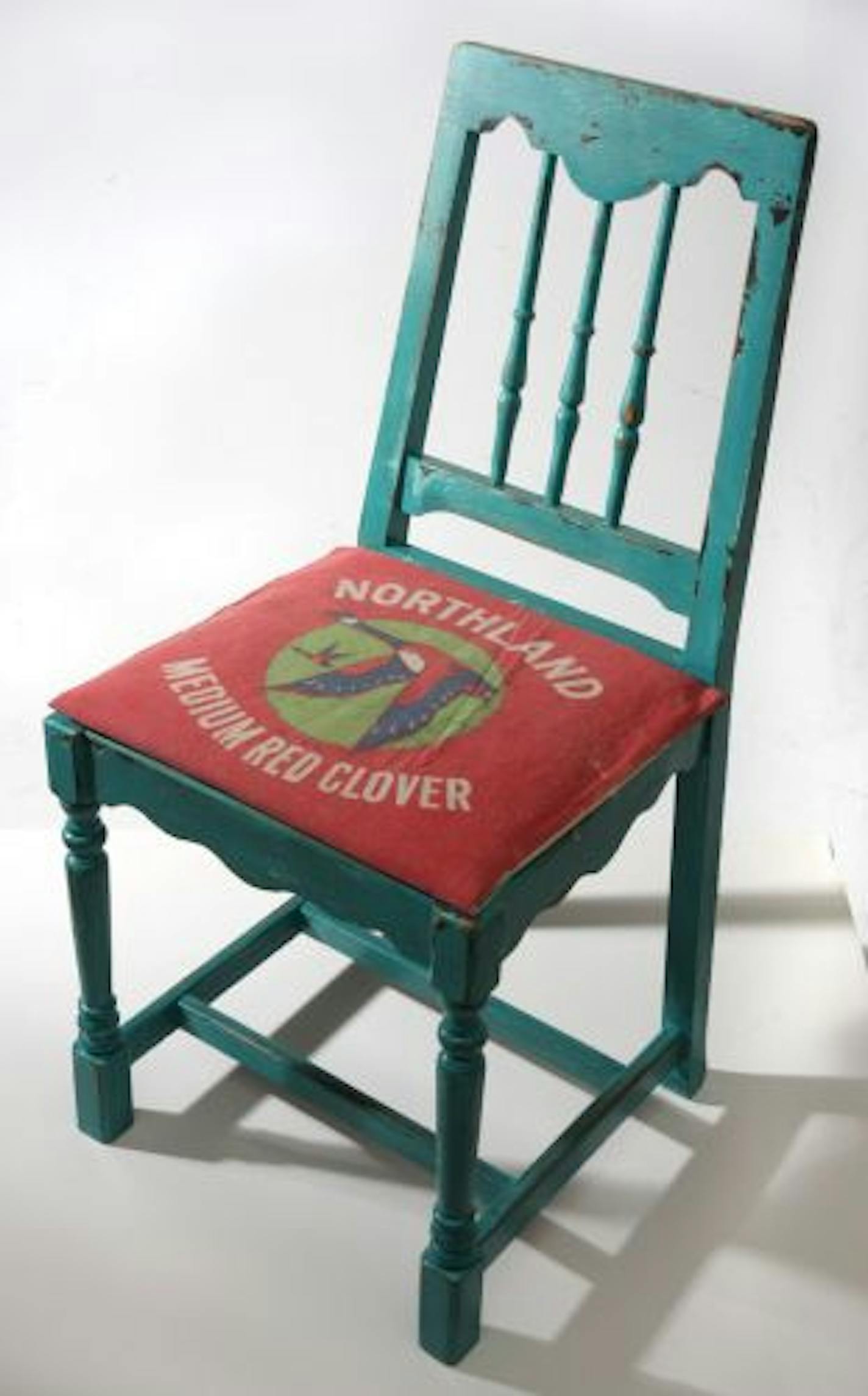 An occasional sale chair has a cushion cover made from an $18 feed sack found at the Buffalo Nickel antique store in Buffalo, Minn.