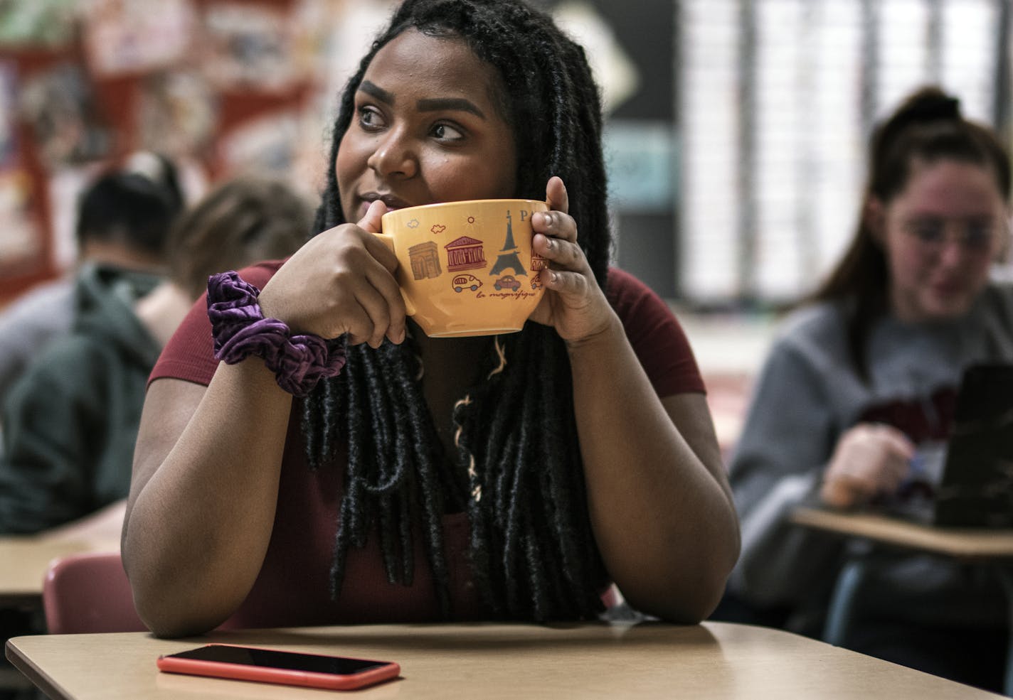 Anani Ali, holding her Paris-themed coffee cup in French class wants to attend American University in Paris to become fluent in French and become a lawyer.] Before AFM was a widely known but rare cause of paralysis in children, Kanani Ali suffered the disorder in 2016 and temporarily lost function in her legs. The Richfield high school senior worked back to the point that she captained her swim team this fall, and wants her experience to offer hope to other children trying to regain lost mobilit