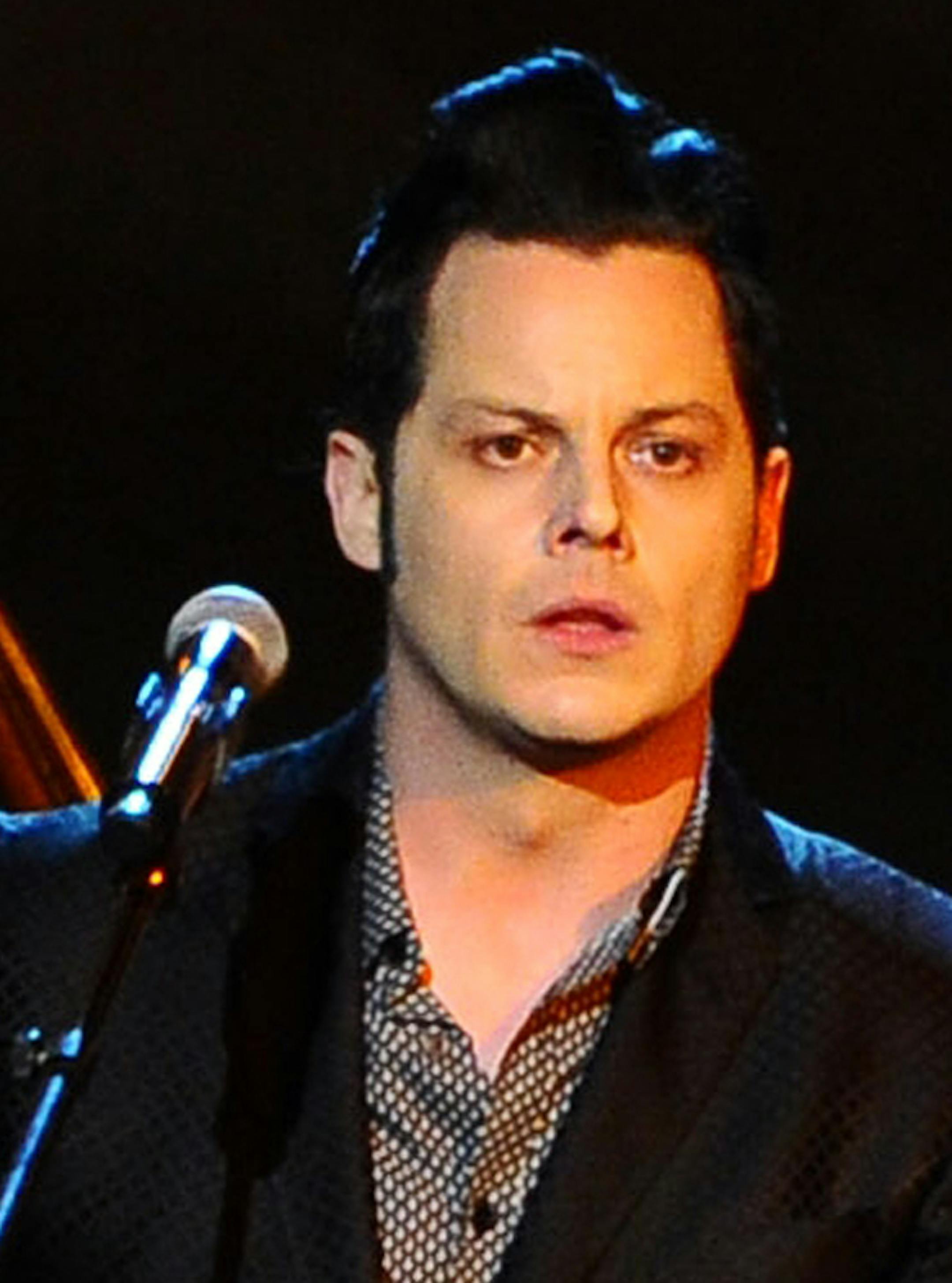 FILE - In this Feb. 6, 2015 file photo, Jack White performs at the 2015 MusiCares Person of the Year show at the Los Angeles Convention Center in Los Angeles. White says heís about to take a long break from performing live but not before holding five mysterious, acoustic-only shows in the five states where he hasnít yet played. The performances will be announced at 8 a.m., local time, on the day of the show. Tickets will cost just $3, be limited to one per person and available only at