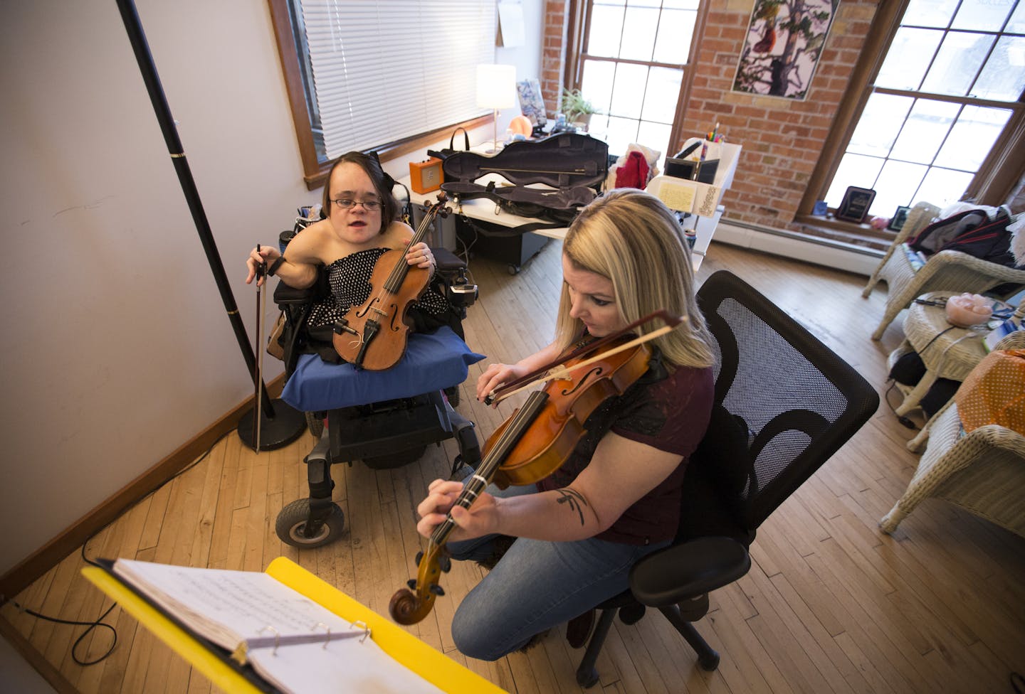 Lea gave a fiddle lesson to Christina Taylor at her Canal Park studio in Duluth, where she filmed her winning Tiny Desk Contest video.