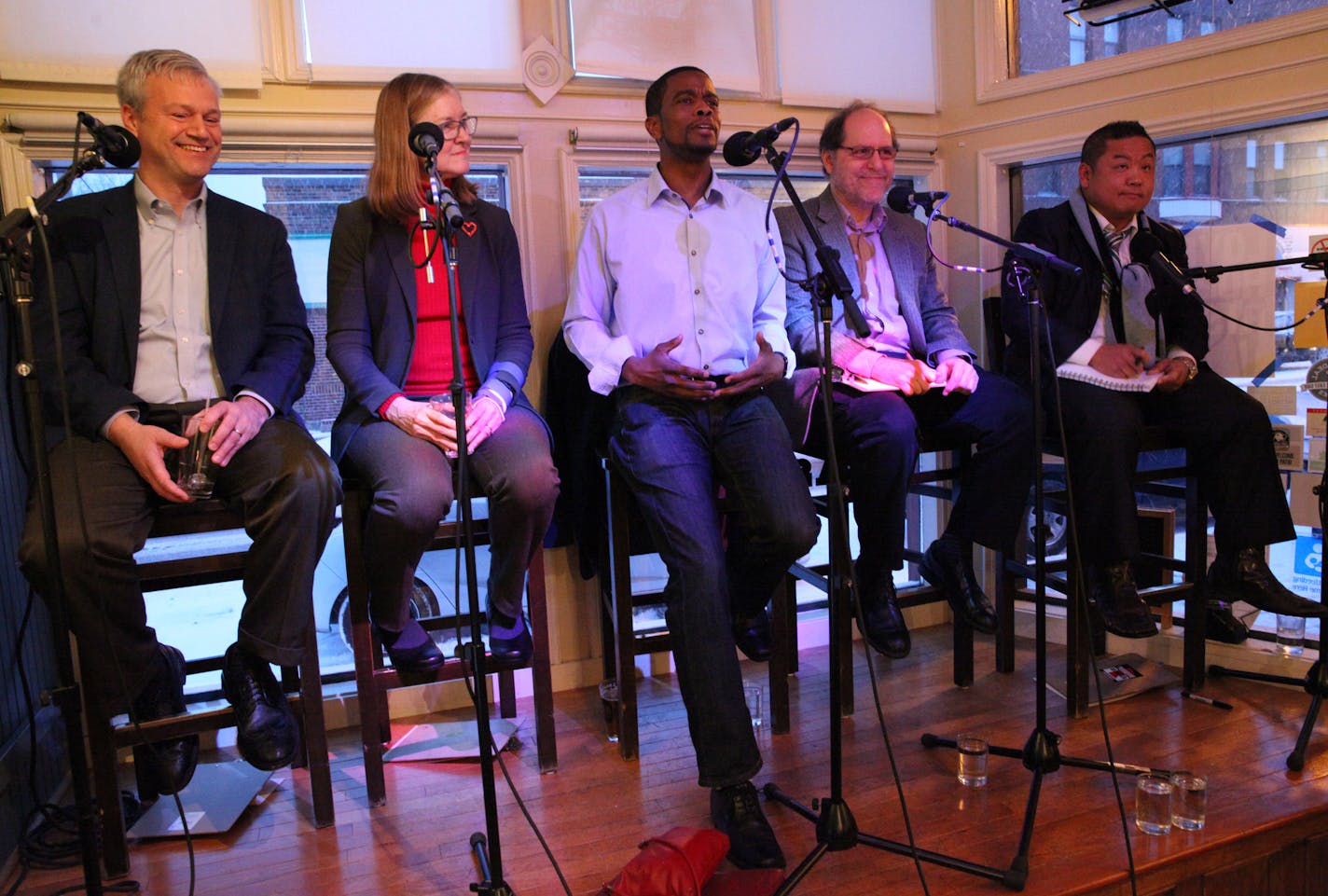 The five St. Paul mayoral candidates: Candidate Pat Harris, Candidate Elizabeth Dickinson, Candidate Melvin Carter III, Candidate Tom Goldstein and Candidate Dai Thao (from left to right). ] XAVIER WANG &#x2022; xavier.wang@startribune.com St. Paul&#x2019;s first mayoral candidate forum in Ward 6 Food & Drink restaurant Sunday. March 12, 2017. in Eastside St. Paul.