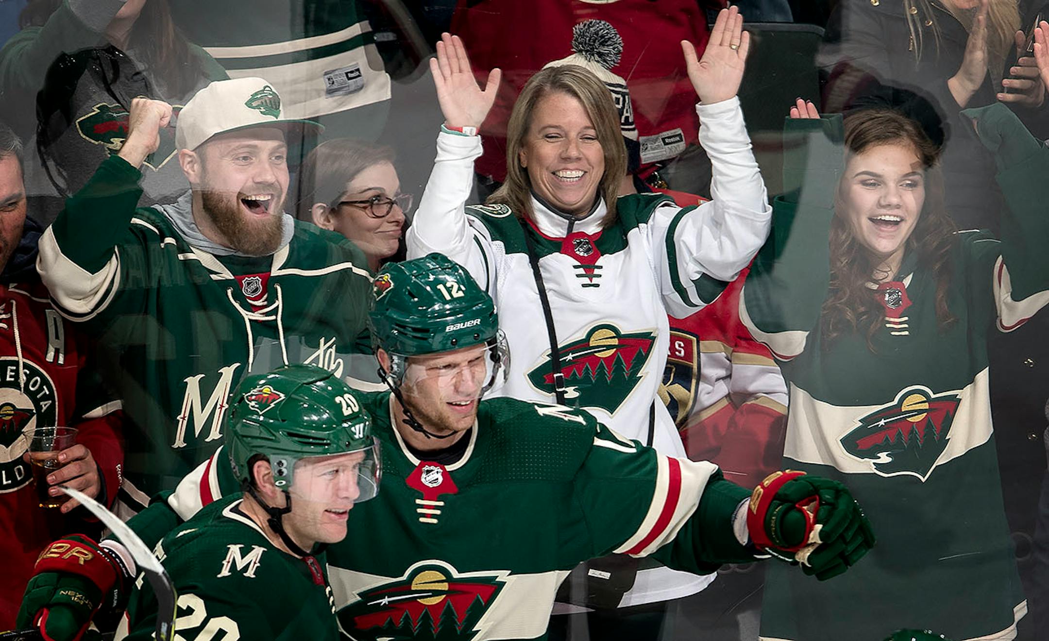 Eric Staal (12) celebrated with Ryan Suter (20) after scoring his second goal on the second period.