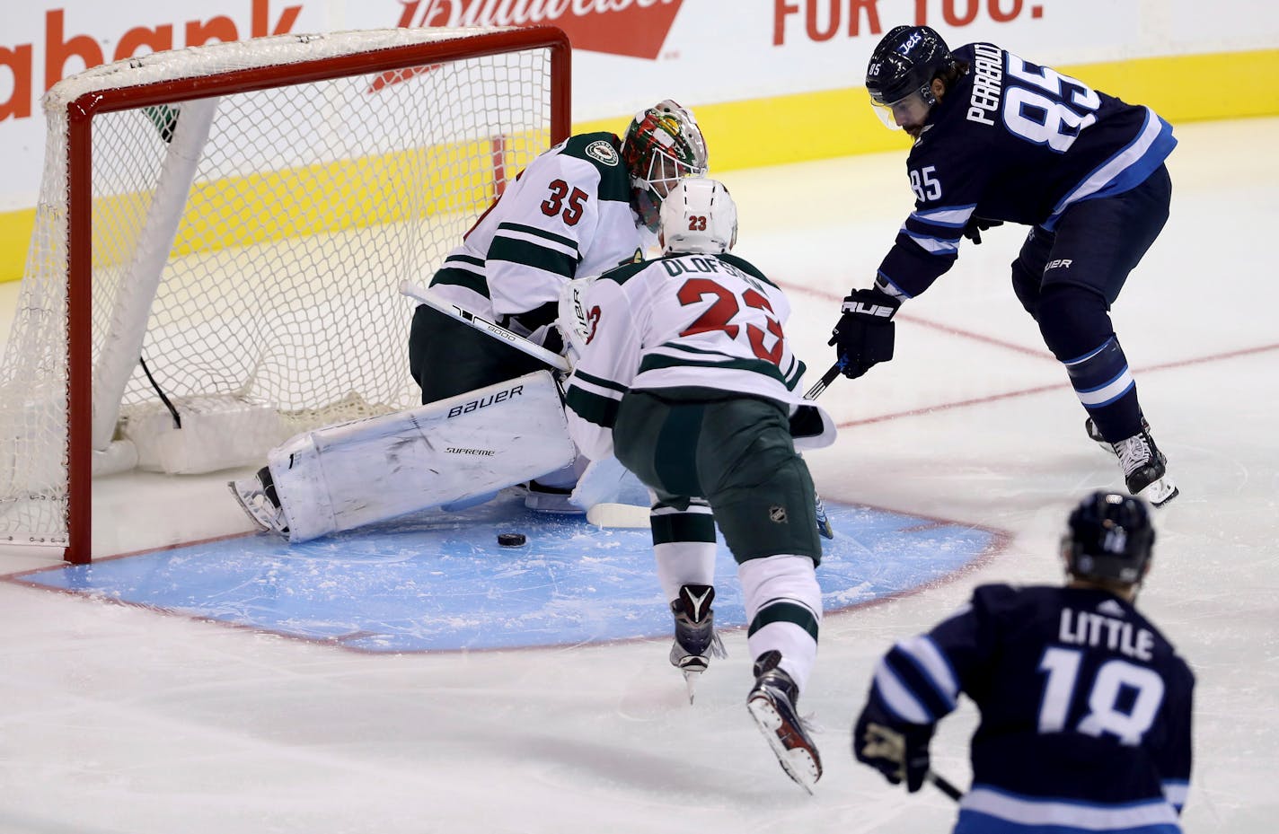 Wild goaltender Niklas Svedberg stopped 22 of 24 shots over two periods in Minnesota's 3-2 shootout victory at Winnipeg in the preseason opener Monday.