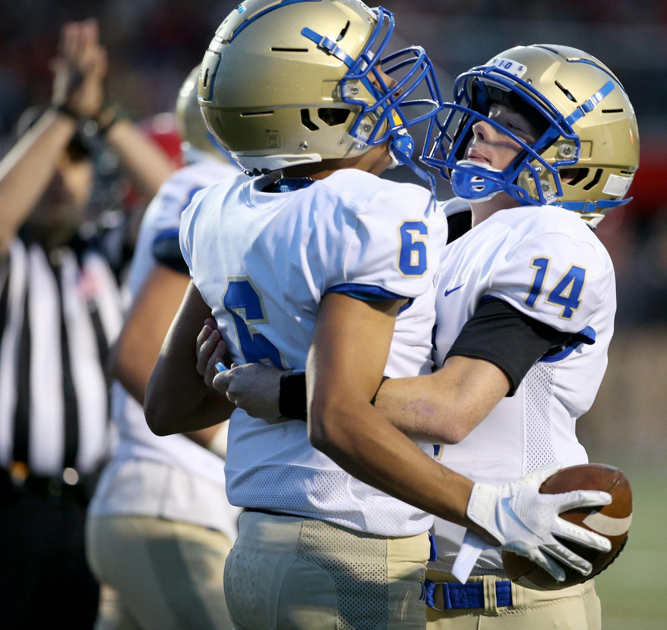 Wayzata receiver Daeshawn Bush (6) celebrates his short TD reception with quarterback Thomas Schmidt (14) during the first half.] DAVID JOLES • david.joles@startribune.com Wayzata at Eden Prairie High School Friday, Sept. 27, 2019, in Eden Prairie,MN.