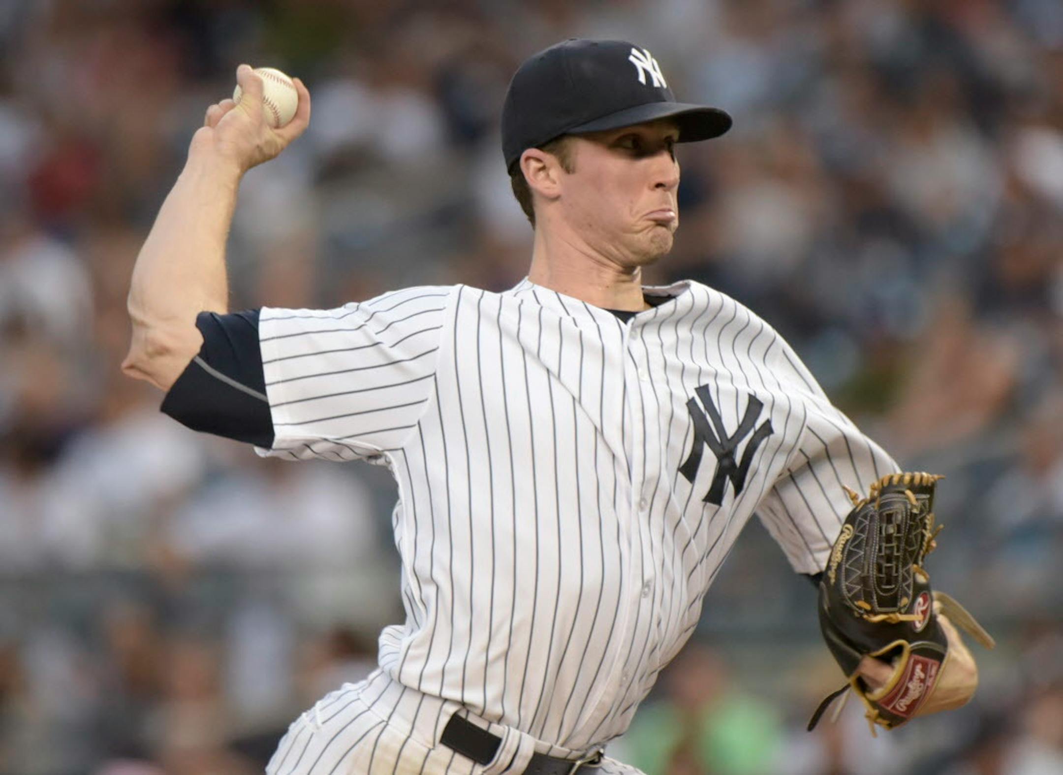 New York Yankees pitcher Bryan Mitchell delivers the ball to the Minnesota Twins during the first inning of a baseball game Monday, Aug 17, 2015, at Yankee Stadium in New York. (AP Photo/Bill Kostroun)