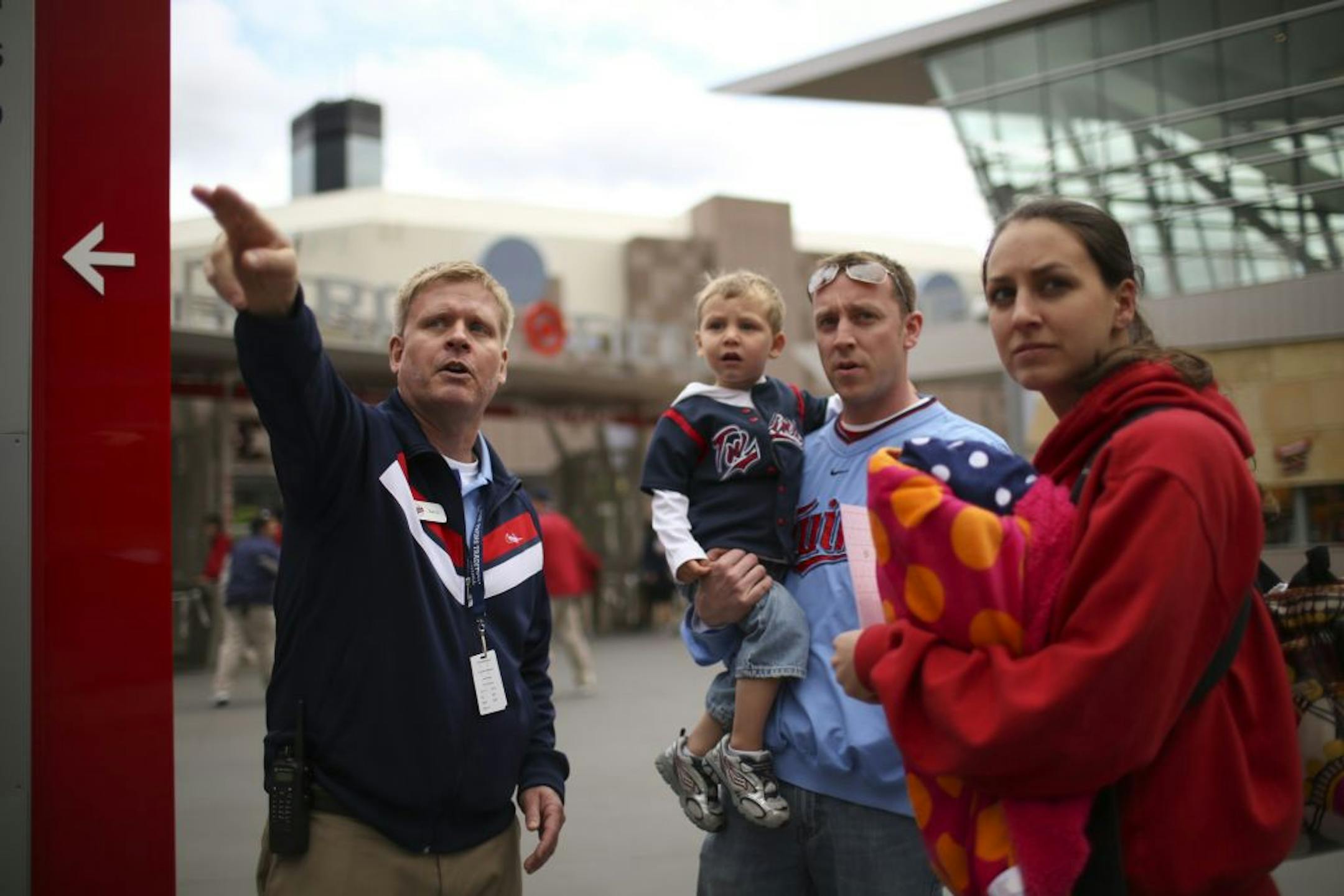 Twins "Wall of Fame" employee Barry Stehlik is busiest just before the start of every game, helping fans get to their seats. That was the case before the Twins' game with the Oakland A's Tuesday night, May 29, 2012, at Target Field in Minneapolis, MInn. Barry Stehlik gave Matt and Ashley Johnson of Shakopee directions to the Budweiser Party Deck before Tuesday night's Twins game. They were with their kids, Brandon, 3, and Jordan, 3 weeks.