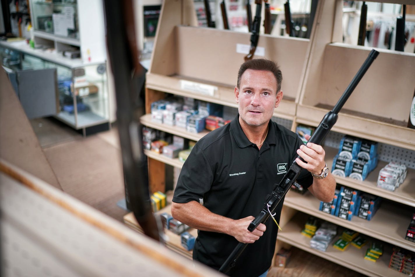 Kory Krause, owner of Frontiersman Sports, a St. Louis Park gun store whose shotgun supply and 9mm handgun supply has been wiped out by customers concerned about the coronavirus pandemic. He has had to put limits on ammunition.