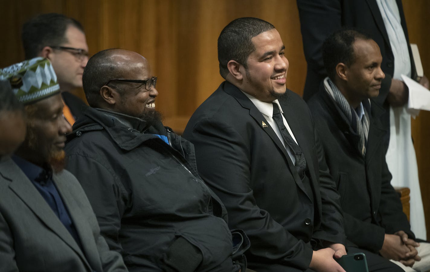 City Council Member Kassim Busuri and his supporters laughed as St. Paul Mayor Melvin Carter addressed the small crowd before he was sworn in at St. Paul City Hall, Wednesday, February 6, 2019 in St. Paul, MN. Busuri, a local educator, is the first Somali-American to serve on the St. Paul City Council. ] ELIZABETH FLORES &#x2022; liz.flores@startribune.com