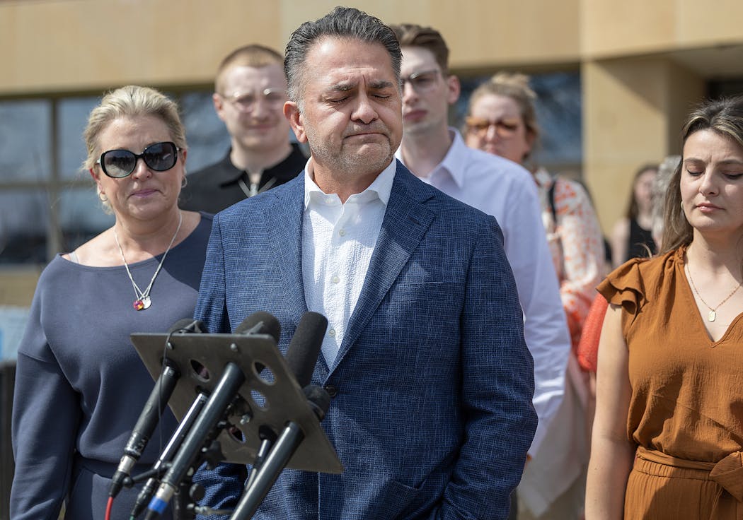 “Justice for Isaac,” said Donny Hernandez, husband of Isaac Schuman’s mother, Alina Hernandez, left, as he tears up while talking to the media after Nicolae Miu’s guilty verdict at the St. Croix County District Court in Hudson, Wis., on Thursday.
