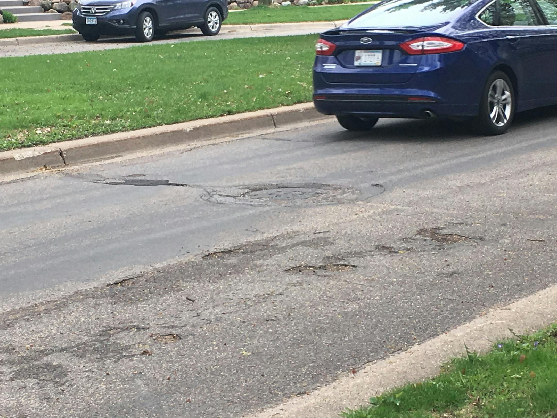 Residents have taken to the streets to push the Park Board to repave potholes in King's Highway.