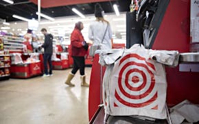 Plastic bags hang on a self checkout kiosk at a Target Corp. store in Chicago, Illinois, U.S., on Saturday, Nov. 16, 2019. Target Corp. is scheduled t