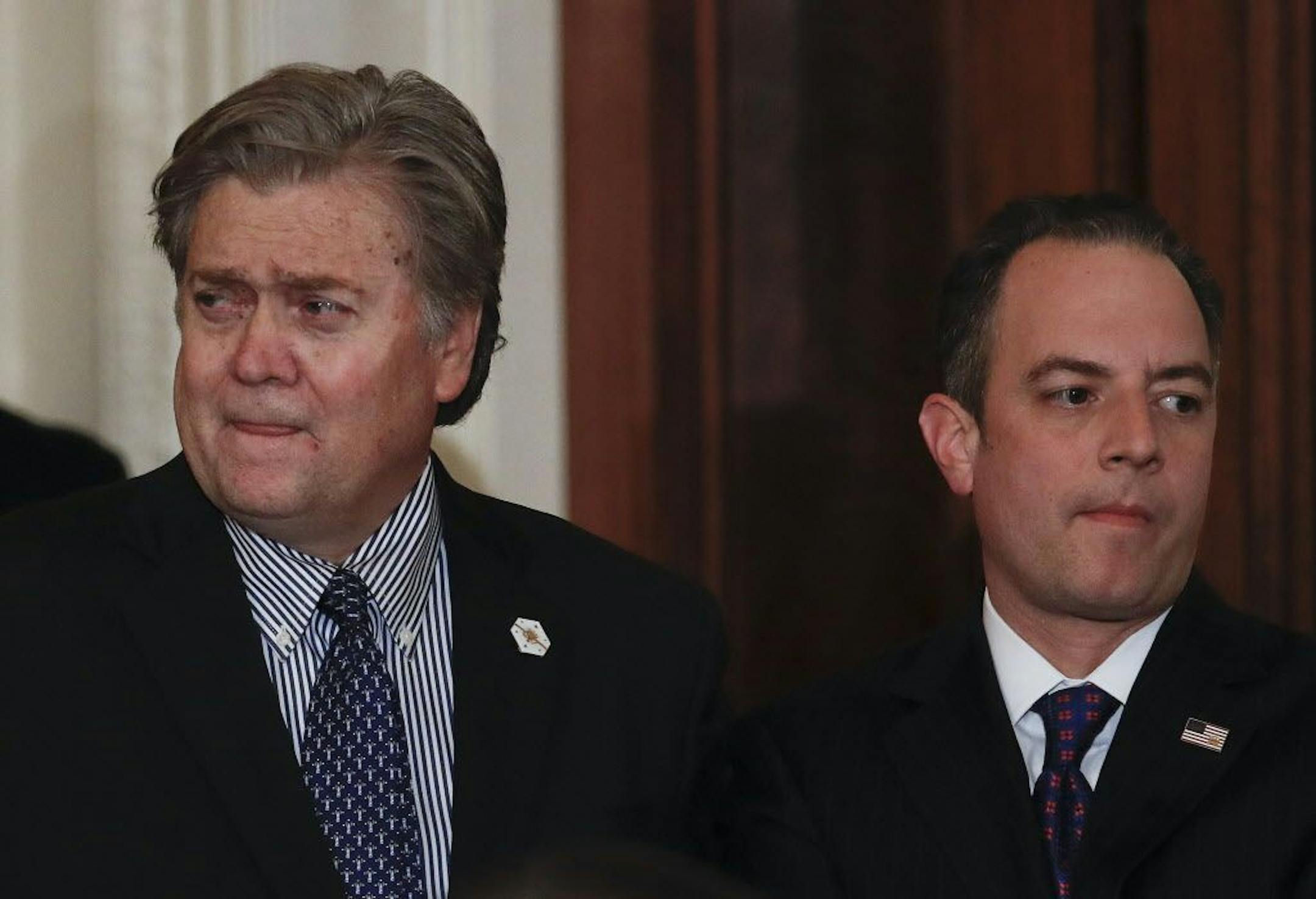 Steve Bannon, chief White House strategist to President Donald Trump, left, and White House Chief of Staff Reince Priebus, stand together in the East Room of the White House in Washington, Tuesday, Jan. 31, 2017, before President Donald Trump arrives to announce Judge Neil Gorsuch as his nominee for the Supreme Court.
