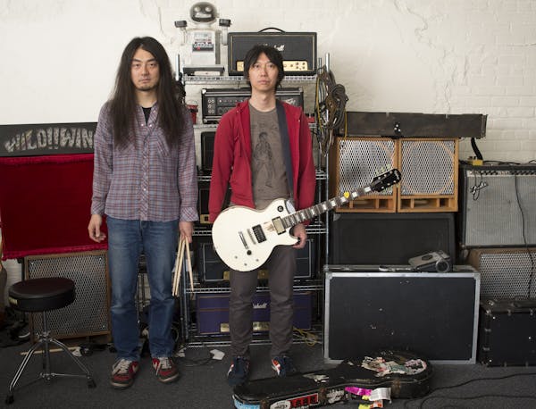 Birthday Suits singer and guitarist Hideo Takahashi, right, and drummer Matthew Kazama, are pictured in a portrait on Saturday afternoon in their prac