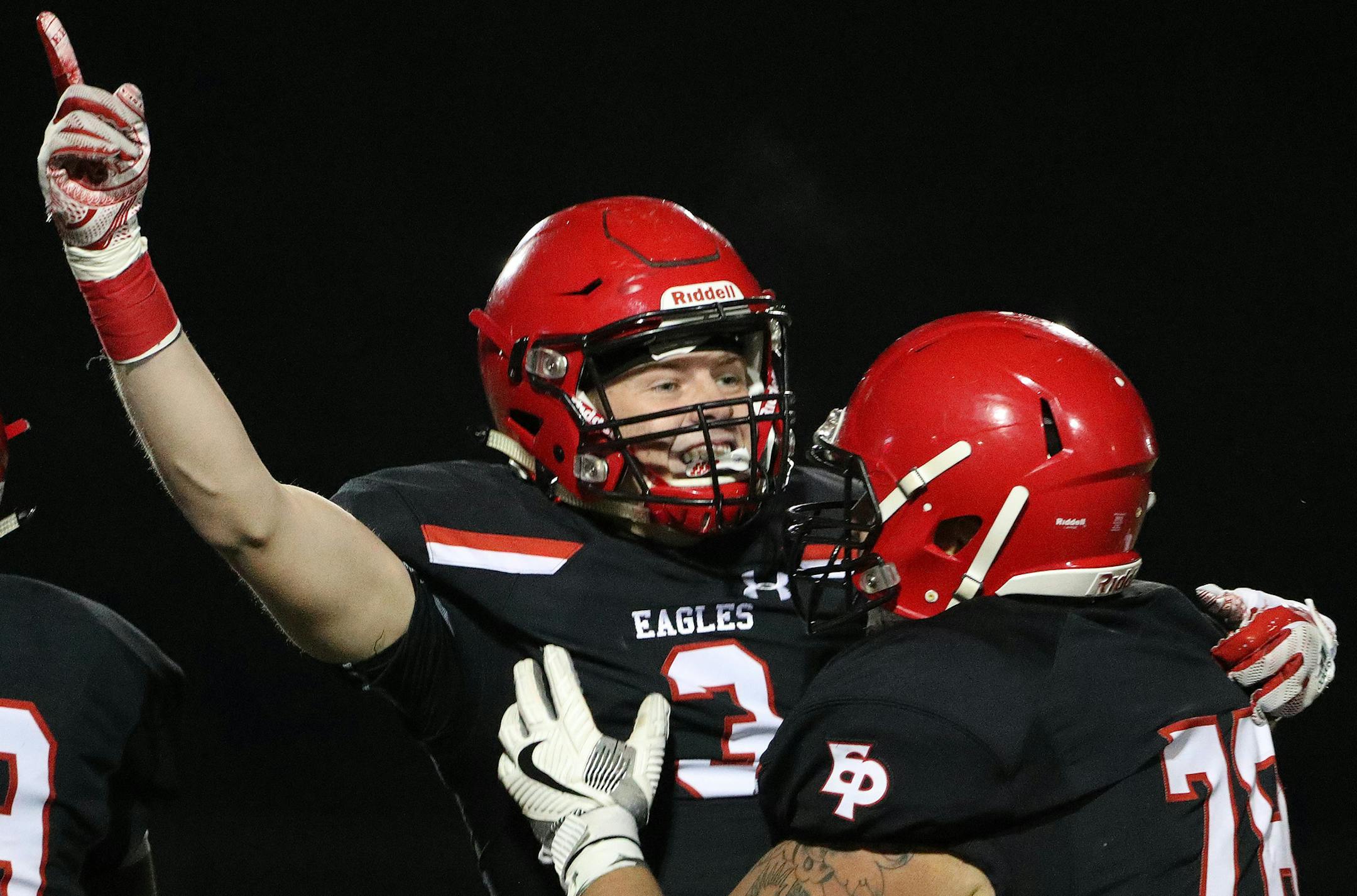 Eden Prairie wide receiver Jack Tuttle (3) celebrated with his teammates after he caught a touchdown pass late in the second half. ] ANTHONY SOUFFLE ï anthony.souffle@startribune.com Game action from a high school football game between Eden Prairie and Minnetonka Friday, Oct. 13, 2017 at Eden Prairie High School in Eden Prairie, Minn.