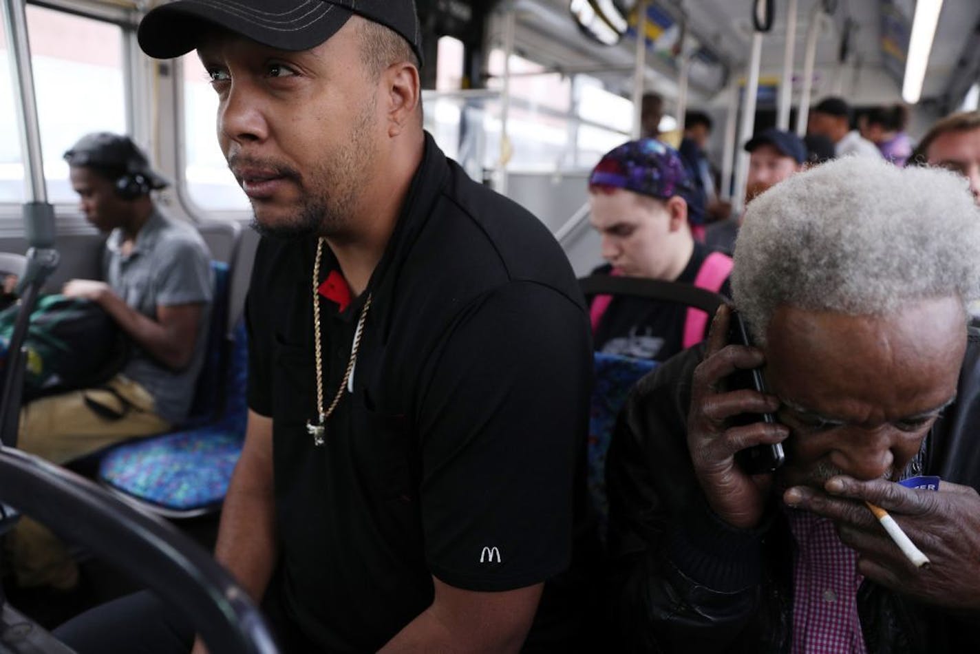 McDonald's employee Steven Suffridge, seen riding the bus to work, said he was disappointed to hear that his employer was paying workers below the $10 minimum wage.