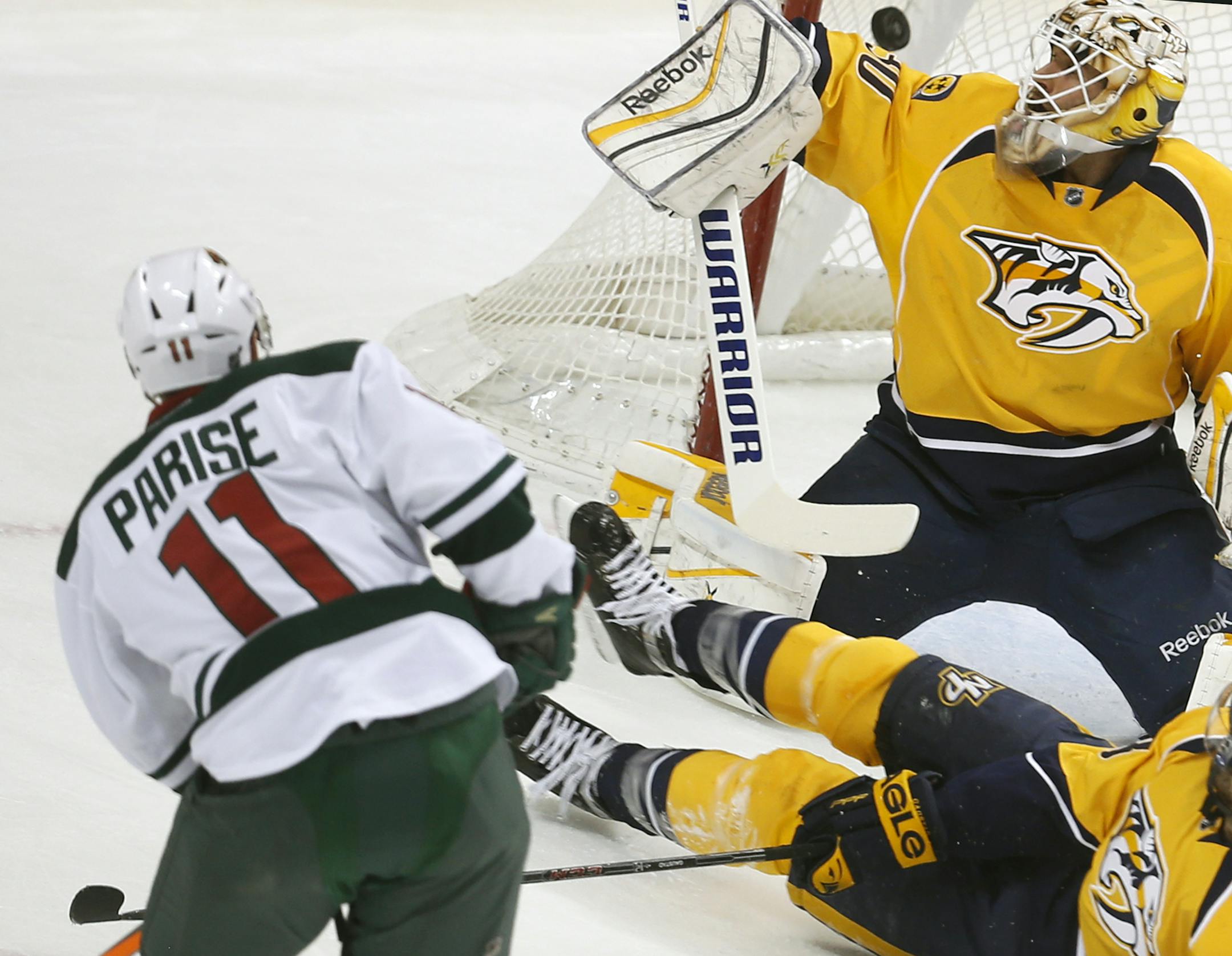 At the Wild game against Nashville, Zach Parise(11) scores a goal against Carter Hutton(30) making the score 2-1 .]rtsong-taatarii@startribune.com