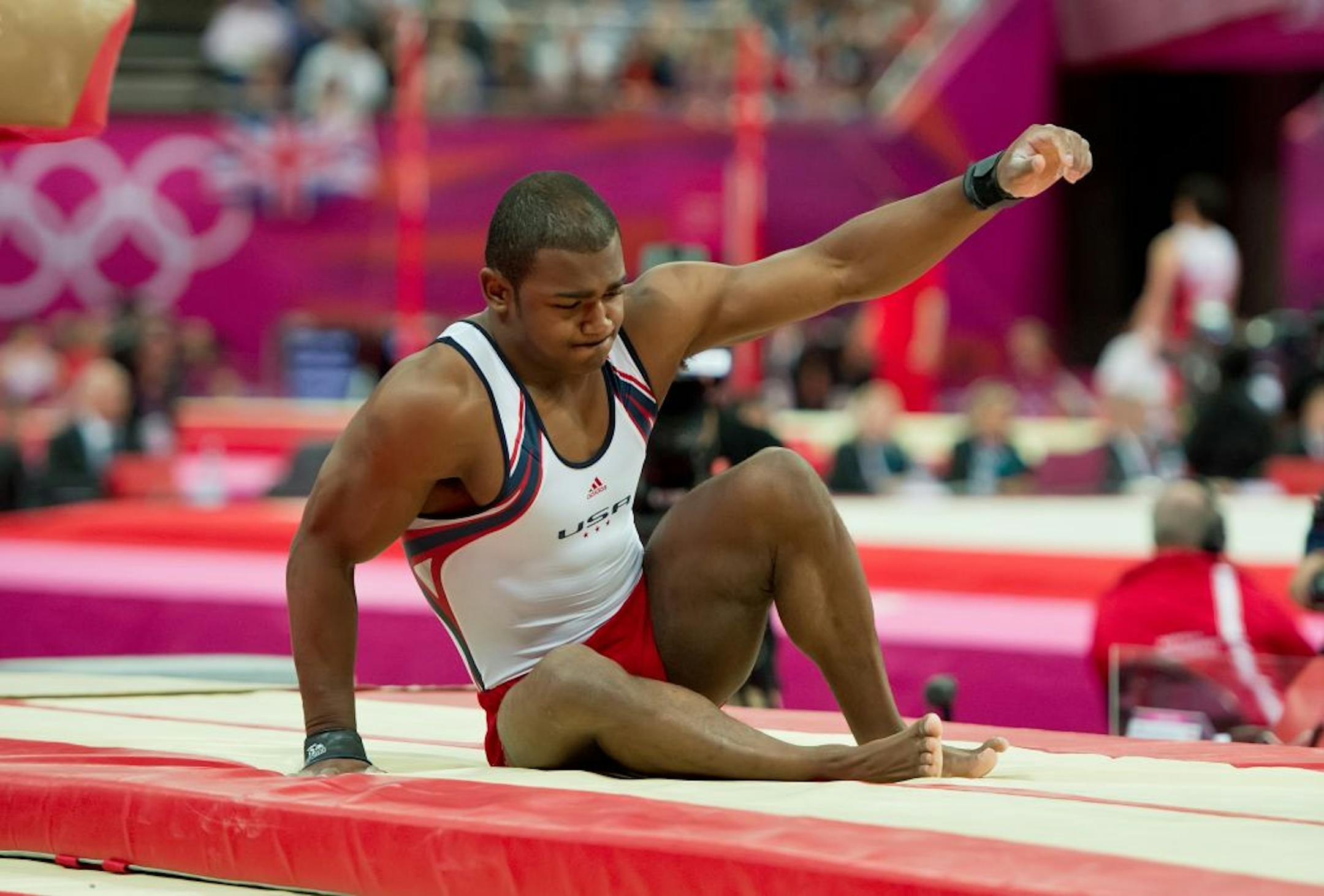 John Orozco of the United States fell during his landing in the vault, one of several costly mistakes the Americans made to drop the team into fifth place.