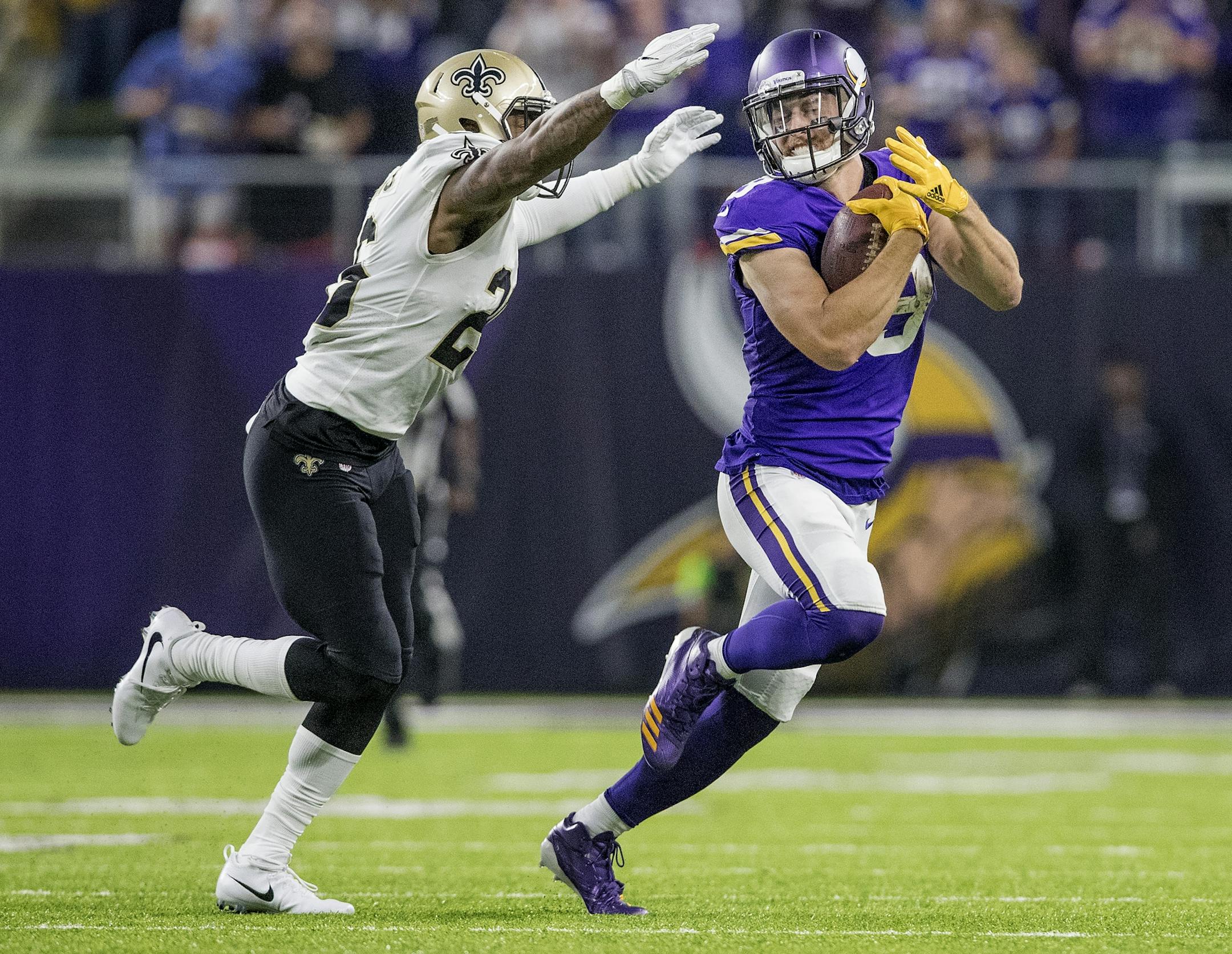 Minnesota Vikings receiver Adam Thielen (19) made a 44-yard catch and run in the second quarter.