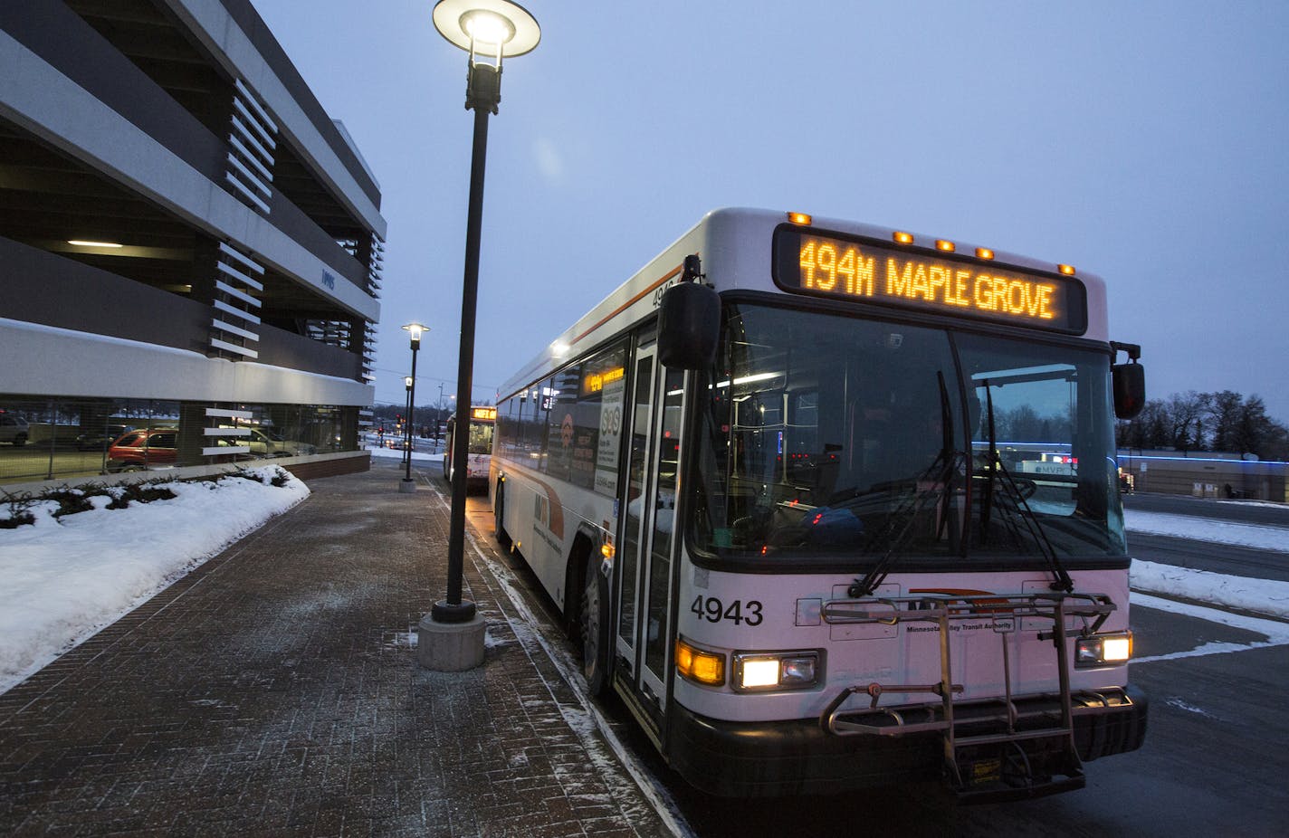 The new Suburb to Suburb Transit Service bus waits for riders in Maple Grove on Monday, February 8, 2016. ] (Leila Navidi/Star Tribune) leila.navidi@startribune.com