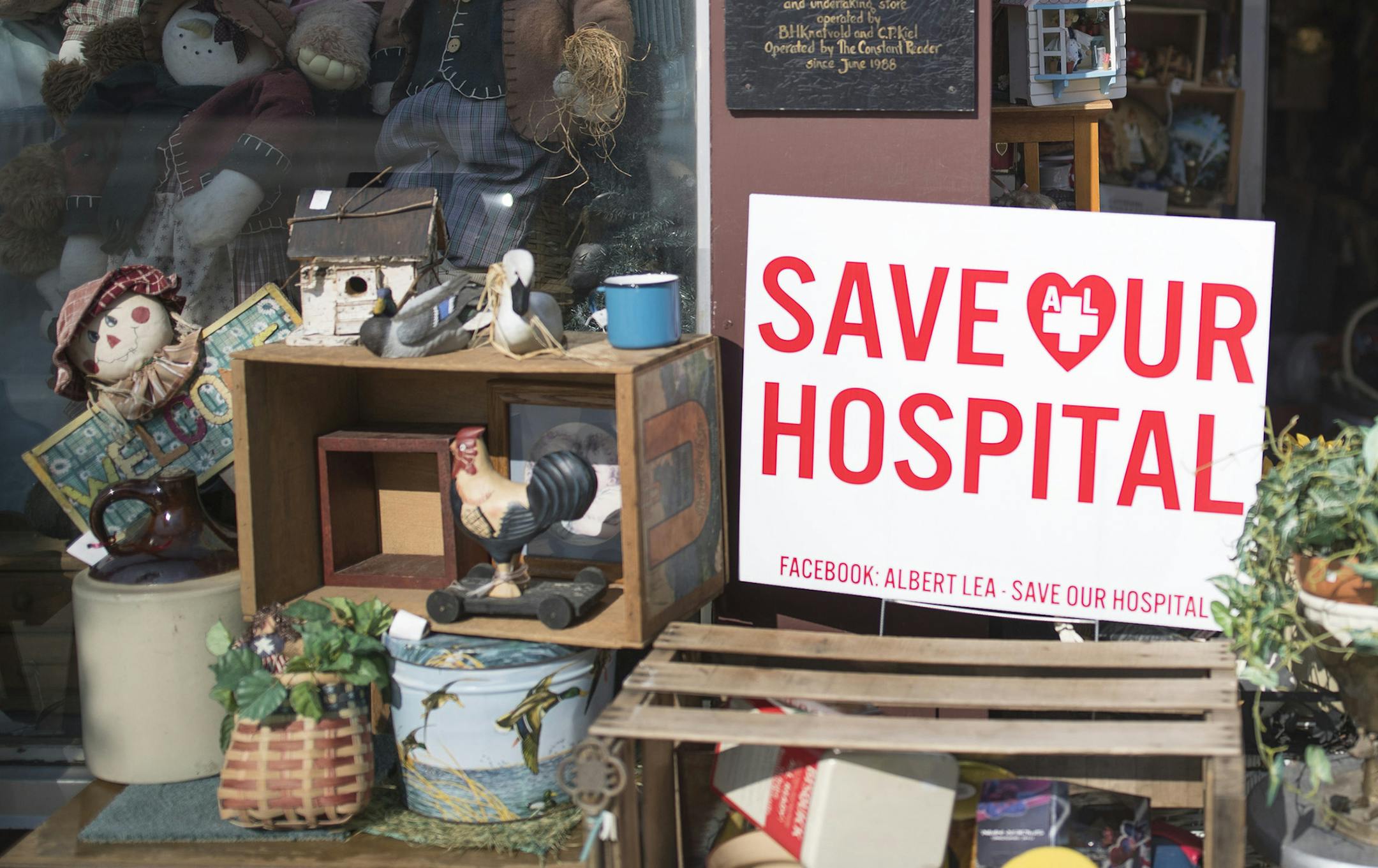 Eloise Adams carried antiques on the sidewalk, as she started the morning at her shop "Adams Originals Shop" Thursday August 24,2017 in Albert Lea, MN. Elise and her husband Jack Adams have been married for 57 years, and their last child was born at the Mayo Hospital. Jack has had two strokes, and is worried about what he would do if the hospital were to close. The Mayo Clinic's plan to remove key inpatient and obstetrics services from its hospital in Albert Lea has caused uproar. ] JERRY HOLT &