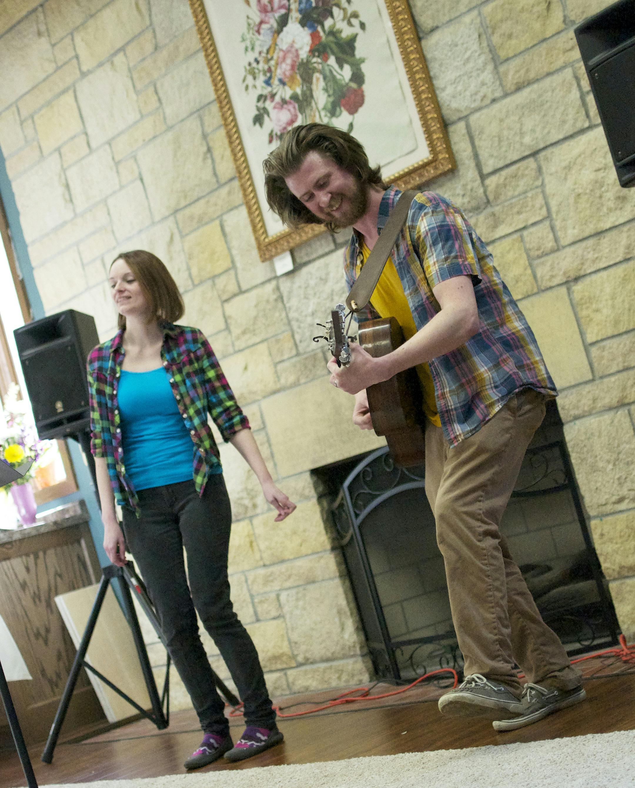 Sarah Allan, of Eagan, and Nathan Griner, of Hastings, perform as &#xec;Banjo and the Bear.&#xee; They performed in the atrium during the Hastings Arts Center's grand opening. Photo by Liz Rolfsmeier, Special to the Star Tribune