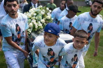 Relatives gathered in September for a funeral service for Marcoz, 14, one of two teens killed in a crash during a high-speed chase. His mother, Tanya 