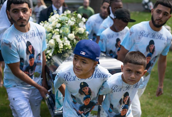 Relatives gathered in September for a funeral service for Marcoz, 14, one of two teens killed in a crash during a high-speed chase. His mother, Tanya 
