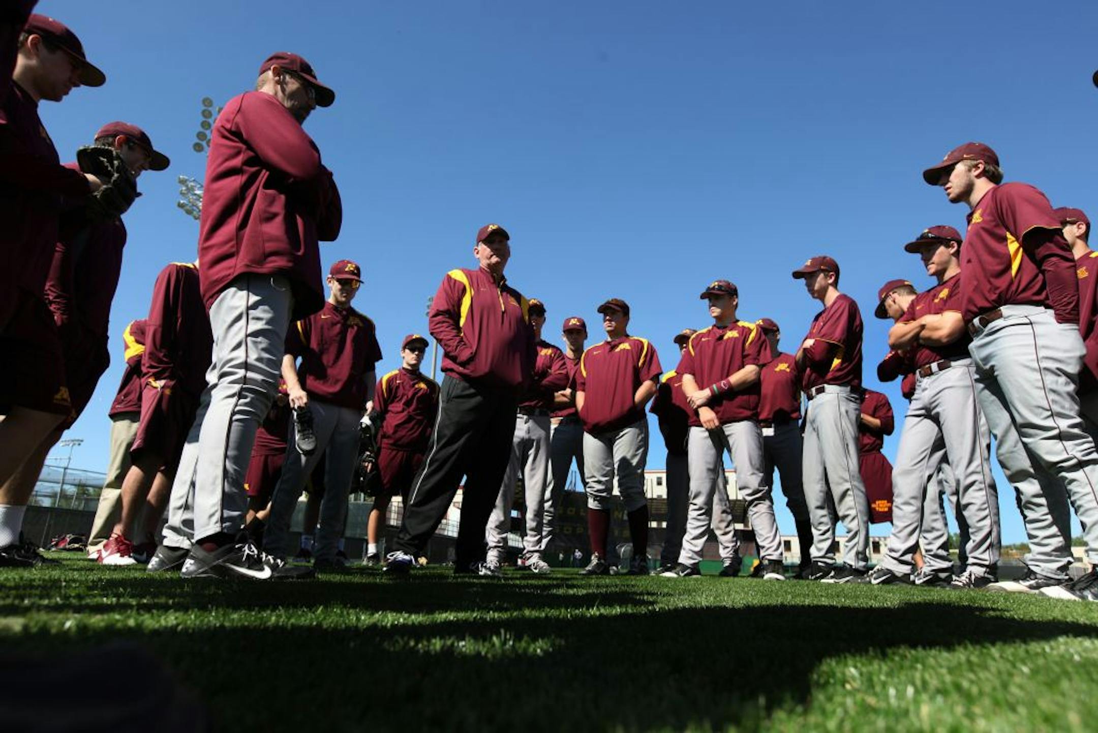 Gophers baseball coach John Anderson was surrounded by his players last season.