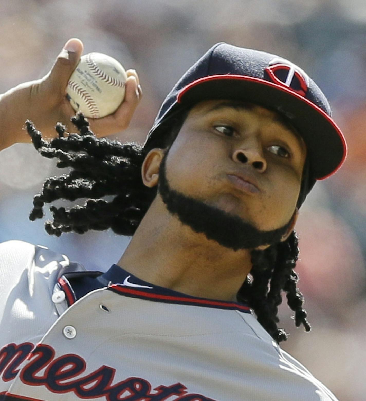 Minnesota Twins starting pitcher Ervin Santana throws during the first inning of a baseball game against the Detroit Tigers, Sunday, Sept. 27, 2015 in Detroit. (AP Photo/Carlos Osorio)