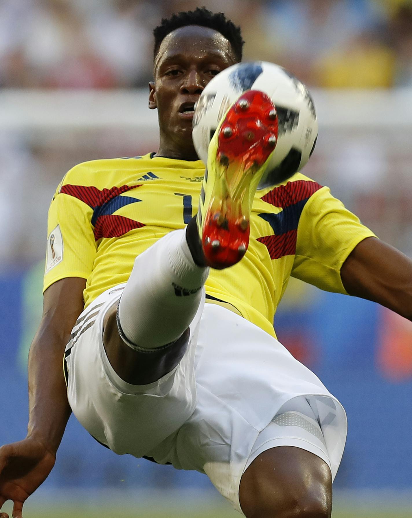 Colombia's Yerry Mina kicks the ball during the group H match between Senegal and Colombia, at the 2018 soccer World Cup in the Samara Arena in Samara, Russia, Thursday, June 28, 2018. (AP Photo/Efrem Lukatsky)