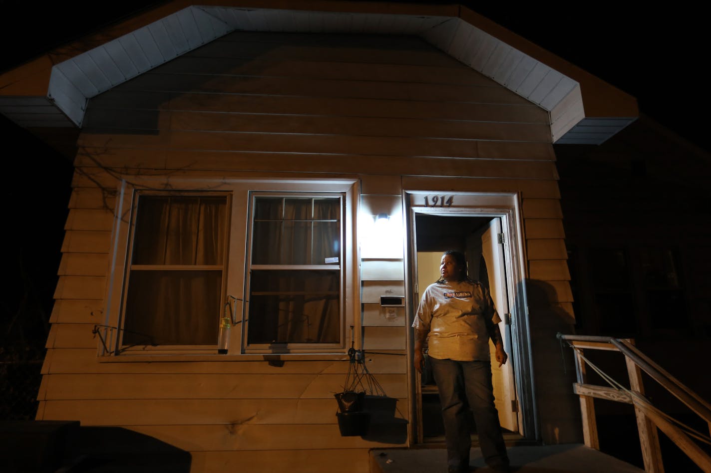 Margaret Morgan stood on the steps of her home on Golden Valley road, one night last fall. Margaret and her husband Jose said that they are concern for the safety of their 14-year-old son Malik Morgan . He is lives with his parents in north Minneapolis, MN ] JERRY HOLT &#x201a;&#xc4;&#xa2; jerry.holt@startribune.com