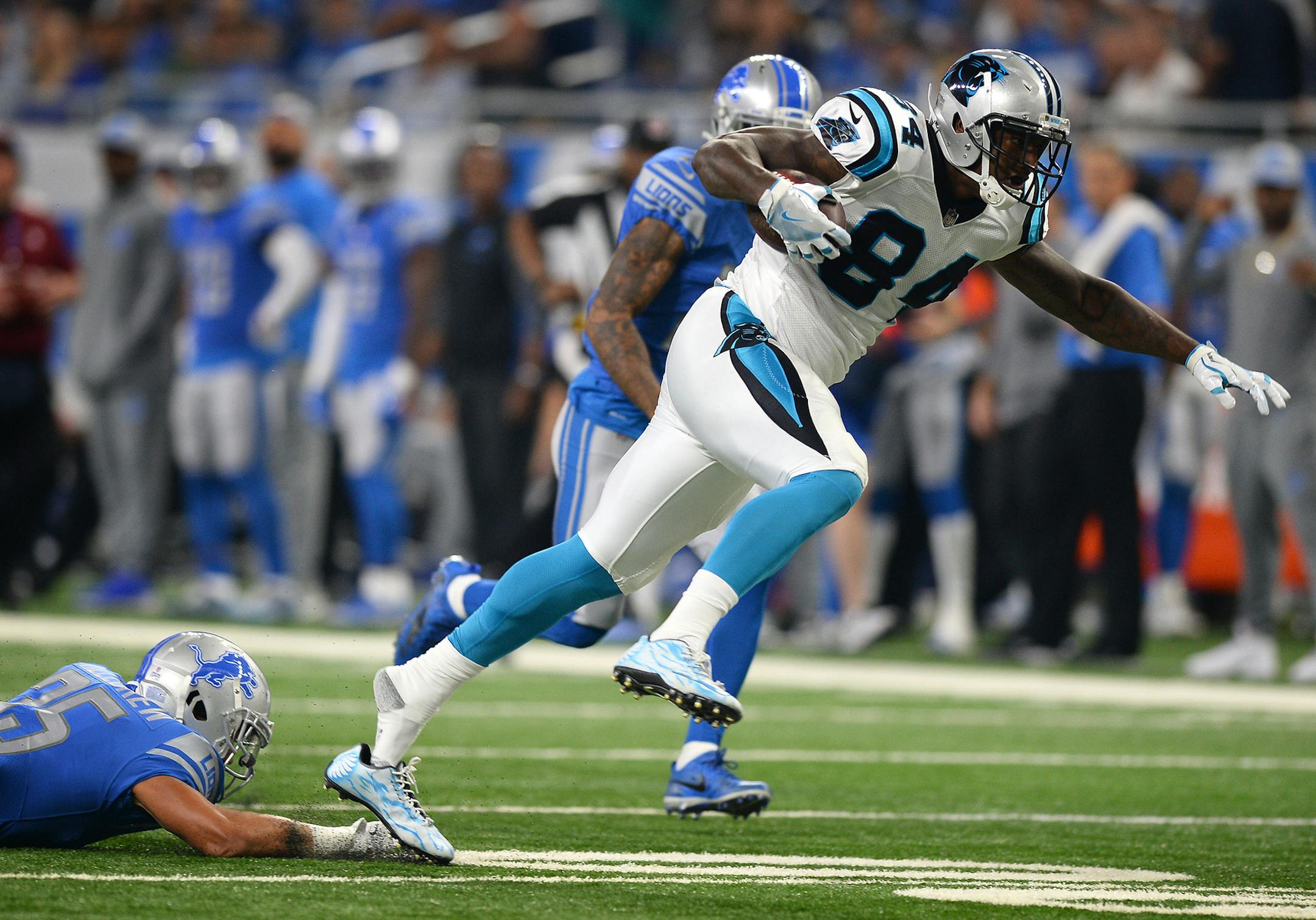 Carolina Panthers tight end Ed Dickson (84) fights for yardage following a pass reception in the first quarter on Sunday, Oct. 8, 2017, at Ford Field in Detroit. (Jeff Siner/Charlotte Observer/TNS)