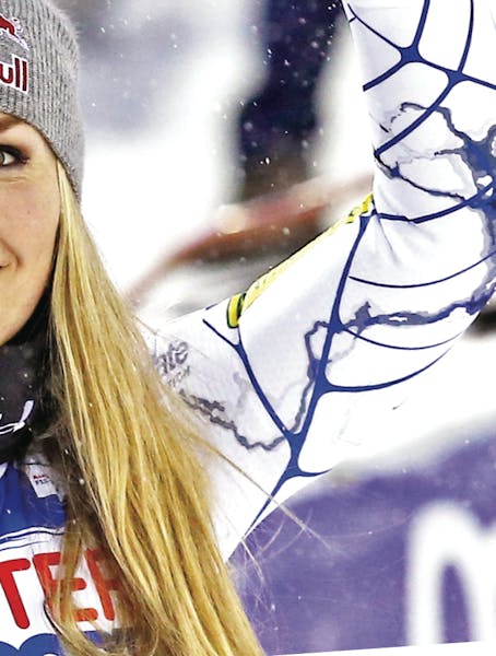 Lindsey Vonn of the United States celebrates in the finish area after winning a women's World Cup giant slalom in Are, Sweden, Saturday, Dec. 12, 2015