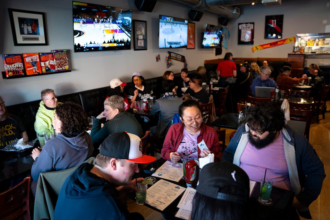 A Bar of Their Own is crowded with people on opening day, March 1, in Minneapolis.