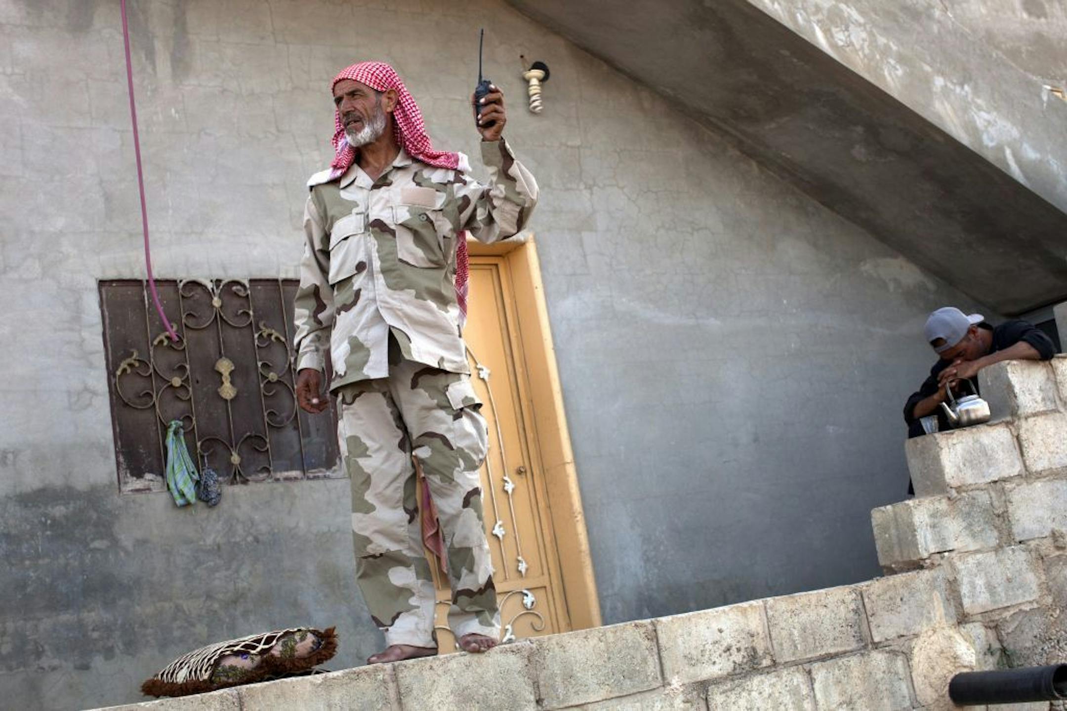 Known as the Watchtower, Mudar Abu Ali, his real name minus his surname which he withholds to protect his family, in Idlib Province, Syria, May 29, 2013. The Watchtower leads a network of rebel spotters in northern Syria who watch roads and military bases, broadcasting warnings about the movement of government forces.