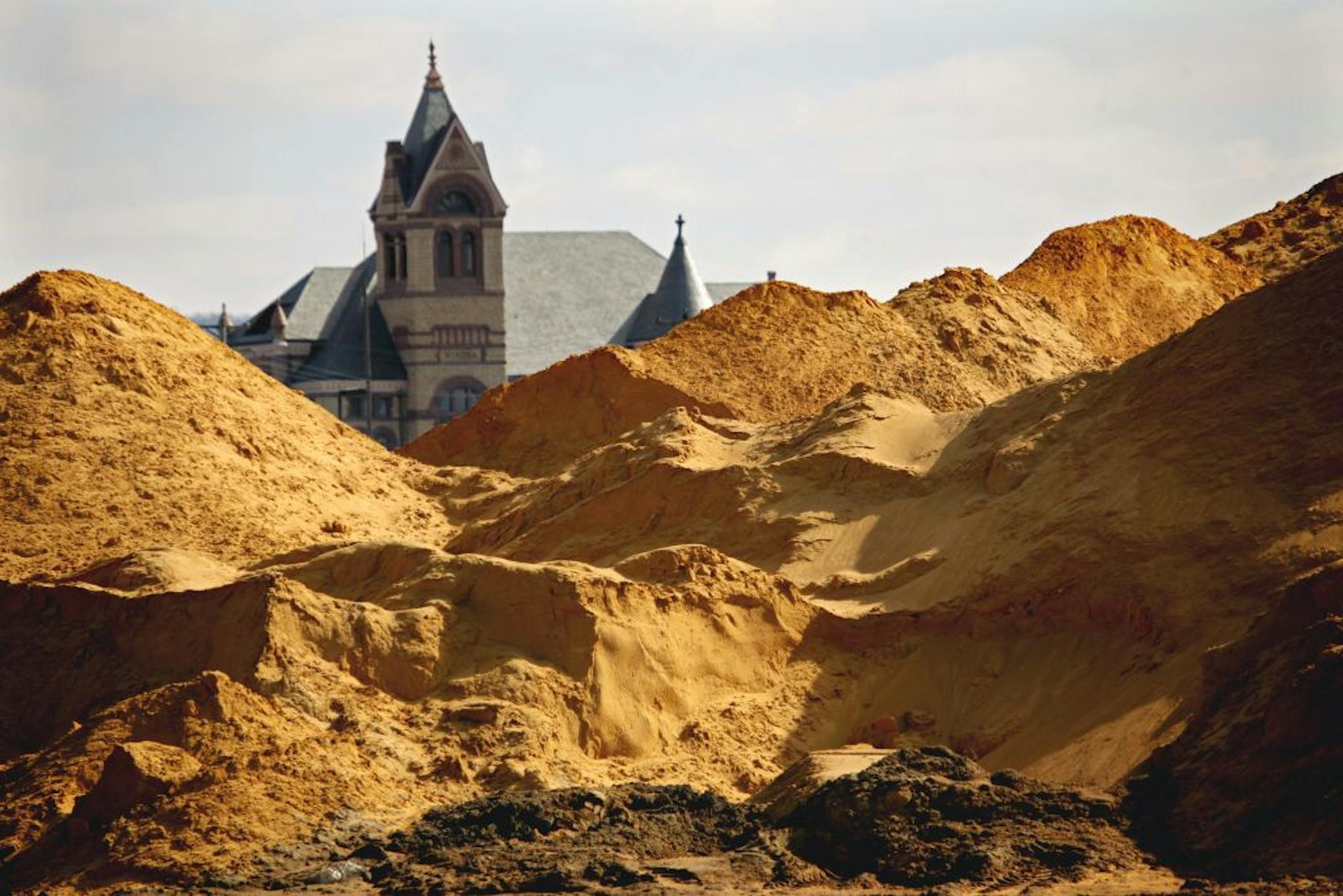 A lightening rod for protests about sand mining is this 50,000 ton pile of sand, refered to as "Mt. Frac" in downtown Winona. The Winona County Law Enforcement Center is in the background.