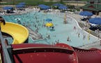 The Apple Valley Aquatic Center closed early Tuesday afternoon after an 18-year-old allegedly pushed an 8-year-old boy off a water slide.