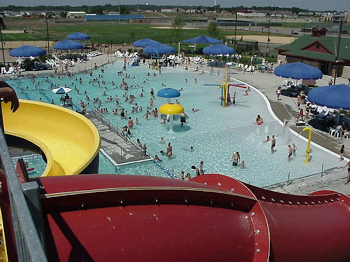 The Apple Valley Aquatic Center closed early Tuesday afternoon after an 18-year-old allegedly pushed an 8-year-old boy off a water slide.