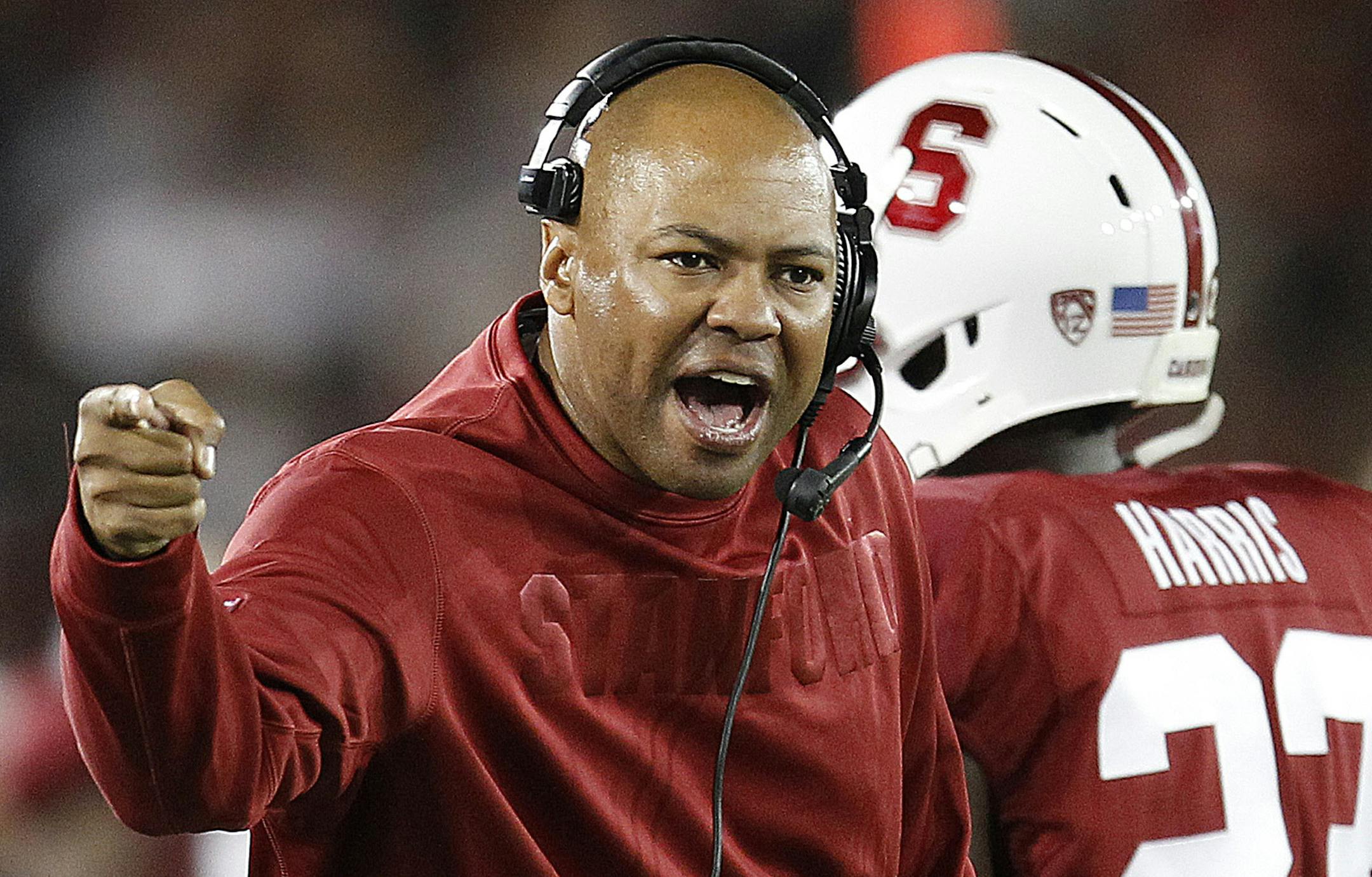 FILe - In this Sept. 7, 2013 file photo, Stanford head coach David Shaw argues a call with an official during the second half of an NCAA college football game against San Jose State in Stanford, Calif. Oregon's Mark Helfrich and Stanford's David Shaw shared some laughs in the offseason about questions concerning their promotions to head coach. Nobody is doubting them this week. No. 2 Oregon is undefeated heading into Thursday night's, Nov. 7, 2013, matchup at No. 6 Stanford. (AP Photo/Tony Avela