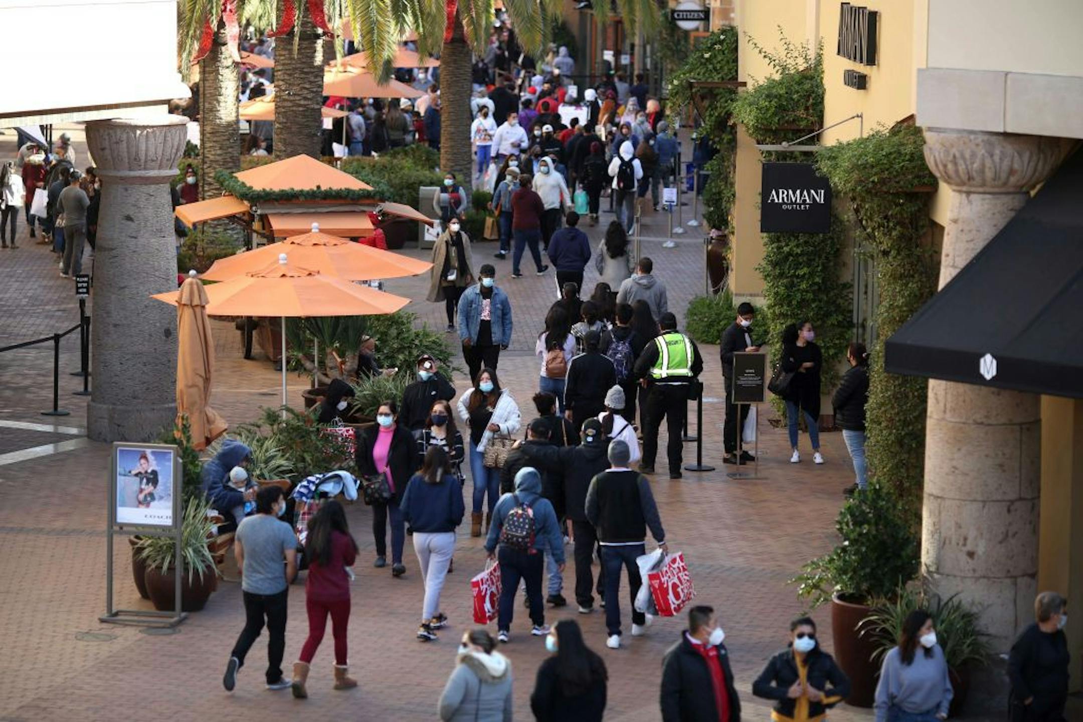 Shoppers fill the walkways at the Citadel Outlets in Los Angeles on Black Friday, November 27, 2020.