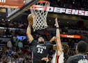 Miami Heat's Hassan Whiteside plays against the Minnesota Timberwolves during the first quarter of an NBA basketball game Friday, March. 17, 2017, in 