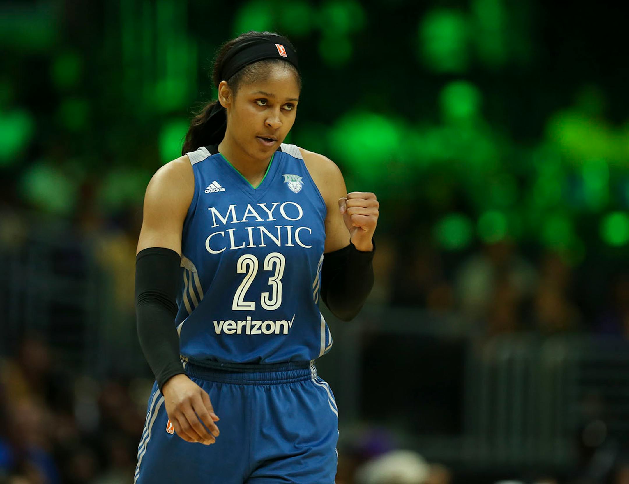 Minnesota Lynx forward Maya Moore (23) pumped her fist as she headed to the bench for a second half timeout.