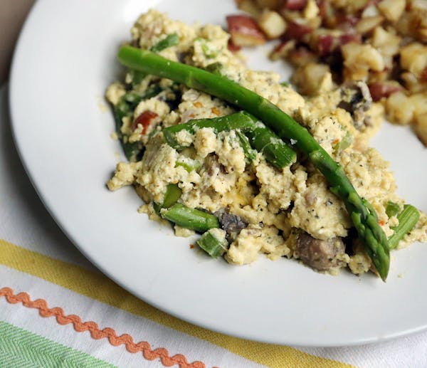 Brunch has practically become a required event on Easter Sunday. One menu suggestion includes Italian scrambled eggs with asparagus and ham, (Stephani