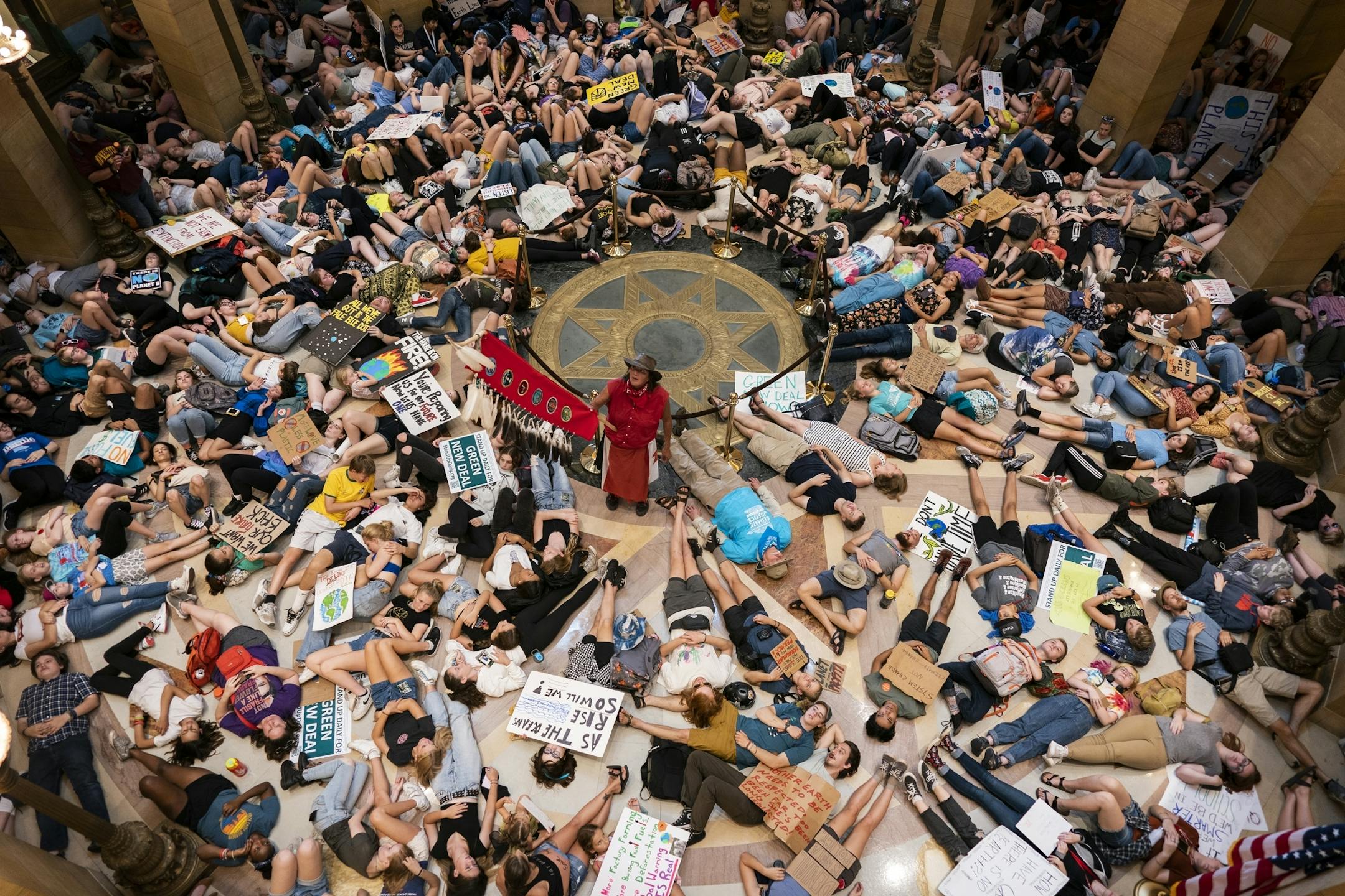 Protesters demonstrated with a "die-in" in the Minnesota Capitol Rotunda.