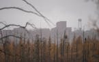 The PolyMet Mining facility rose through the fog in the distance on Wednesday October 14, 2020. The mine sits on the edge of Hoyt Lake, Minn. and has 