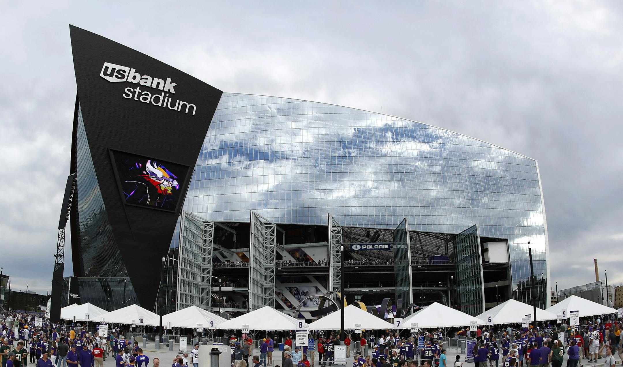 Fans outside of US bank Stadium before Sunday night's game between the Minnesota Vikings and Green Bay Packers. ] CARLOS GONZALEZ cgonzalez@startribune.com - September 18, 2016, Minneapolis, MN, US Bank Stadium, NFL, Minnesota Vikings vs. Green Bay Packers ORG XMIT: MIN1609181847420822