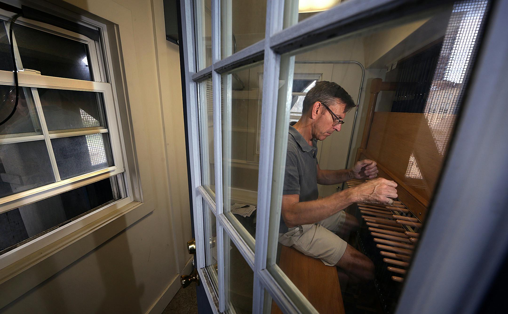 Mark Sedio recently played the carillon just beneath the bells in the Central Lutheran Church bell tower.
