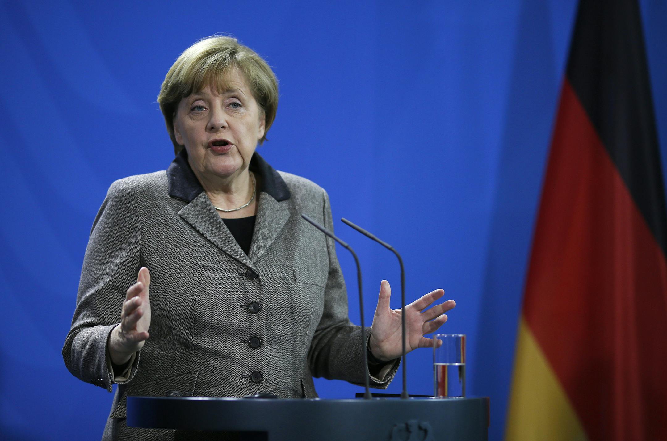 German Chancellor Angela Merkel attends a news conference with the President of Afghanistan, Ashraf Ghani, after a meeting at the chancellery in Berlin, Wednesday, Dec. 2, 2015.