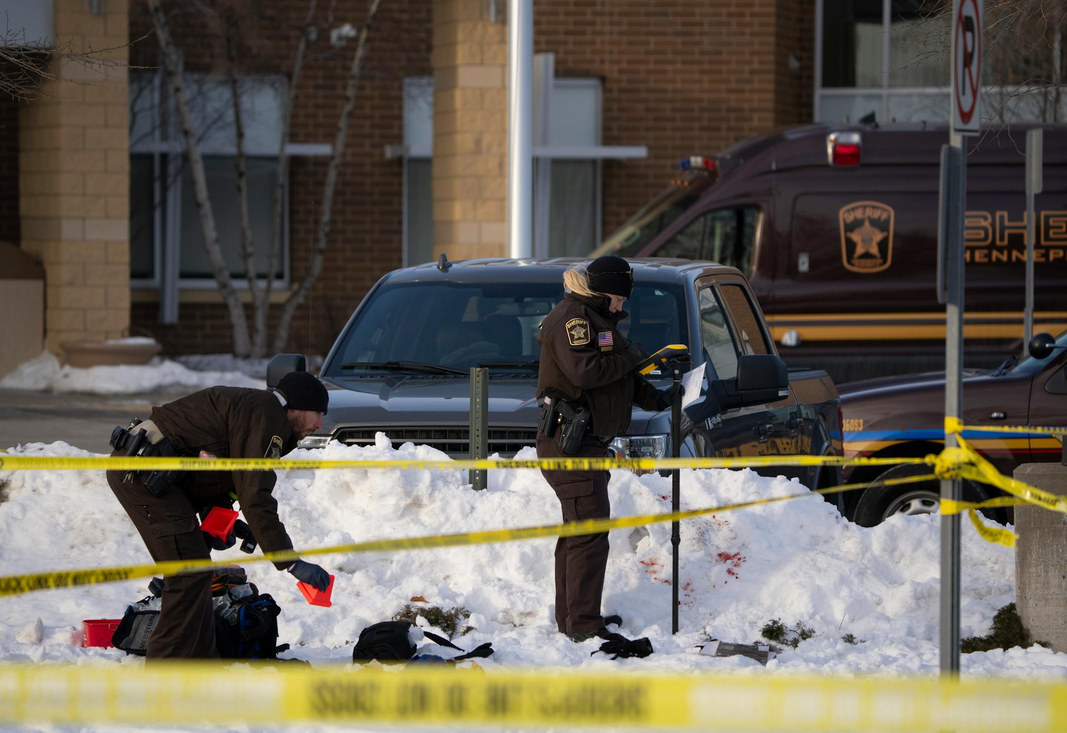 Investigators from Hennepin County Sheriff's office began processing the scene of the shooting Tuesday afternoon, February 1, 2022 at the South Education Center, an alternative school in Richfield, Minn. Two students were shot, one of them fatally, outside the South Education Center, an alternative school Tuesday afternoon. ] JEFF WHEELER • Jeff.Wheeler@startribune.com