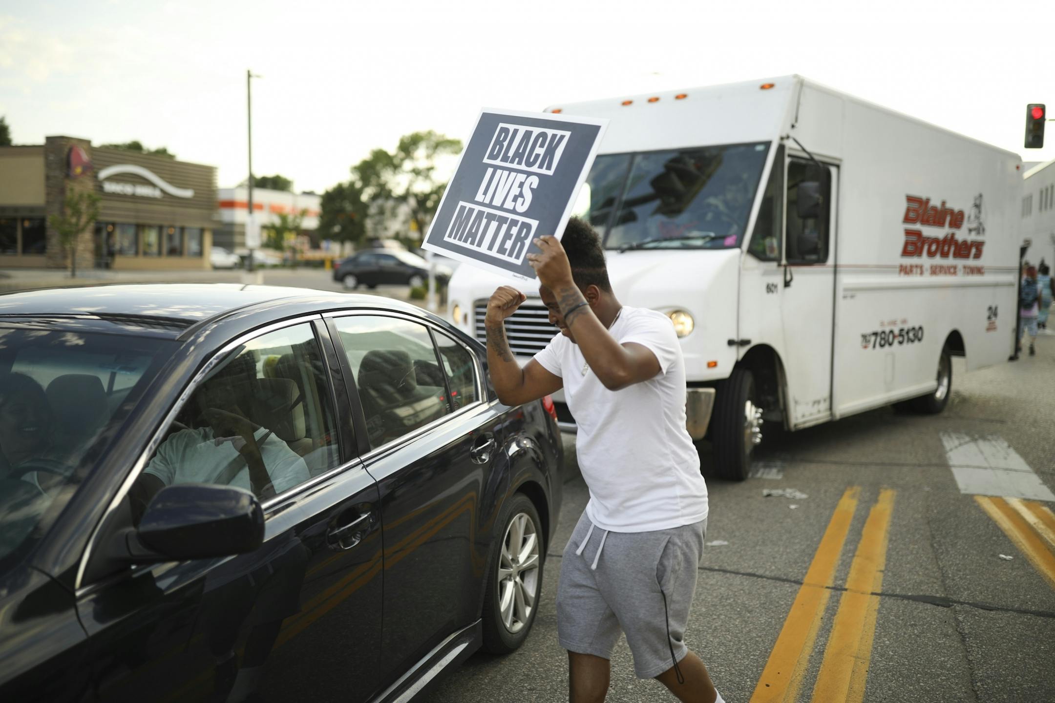 As the Peace walkers headed back west on W. Broadway Ave. after briefly blocking the intersection with Washington Ave. N., Rashaun Brown, a cousin of Thurman Blevins, pumped his fist as a motorist going the other direction honked his horn in support.